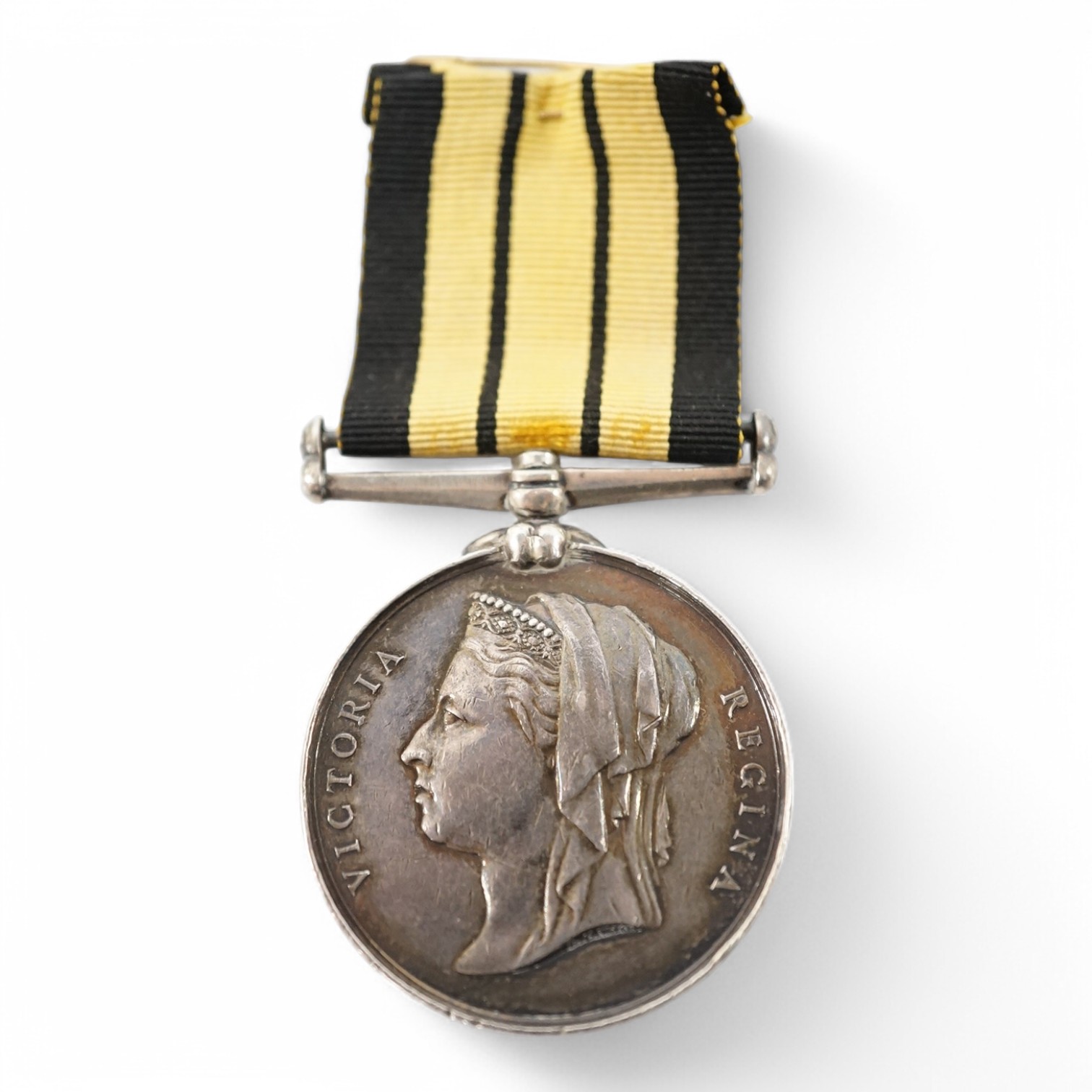A Queen Victorian East and West Africa Medal, awarded to ‘1388 2nd Corporal, E. Dalby, A.H.C., 1873-4’. Condition - some significant wear to the rim, and the edge possibly skimmed and re-engraved in places.